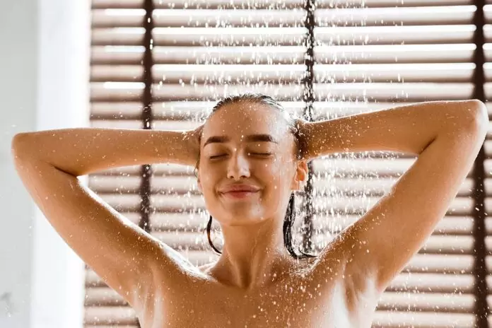 woman enjoying hot shower
