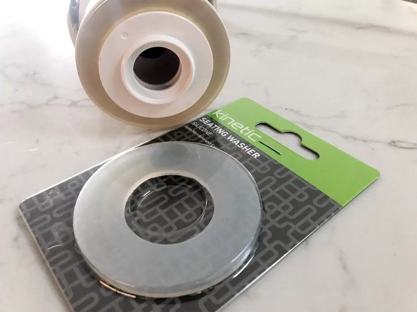 Silicone seating washer used to seal toilet outlet valve to cistern base