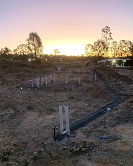 Compliant stormwater and sewer pipework completed on a new Brisbane property, awaiting backfill