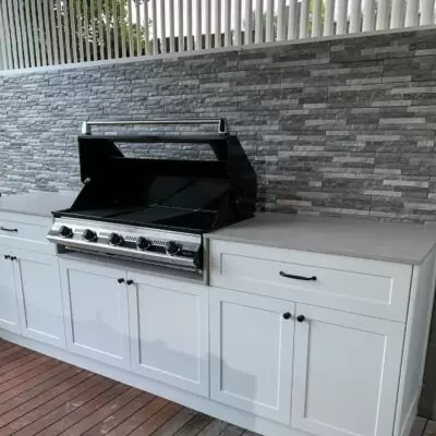 Outdoor kitchen with gas BBQ installed by licensed gas fitter.