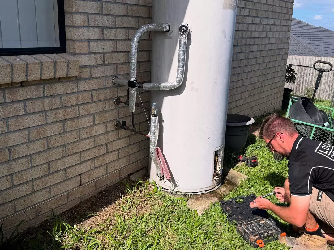 removing old hot water unit