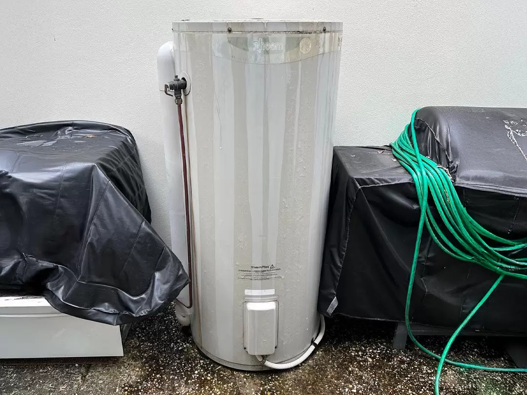 hot water system leaking from top