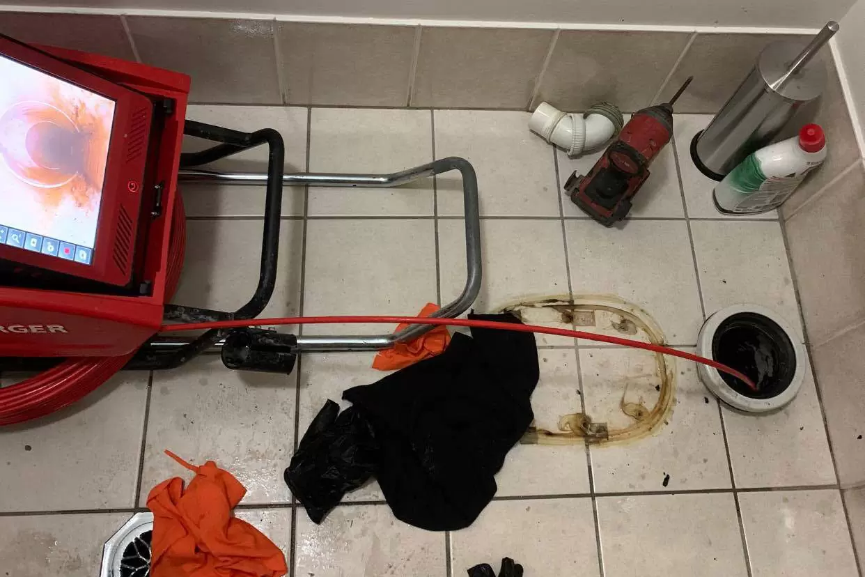CCTV drain camera inspection showing blockage inside sewer pipe